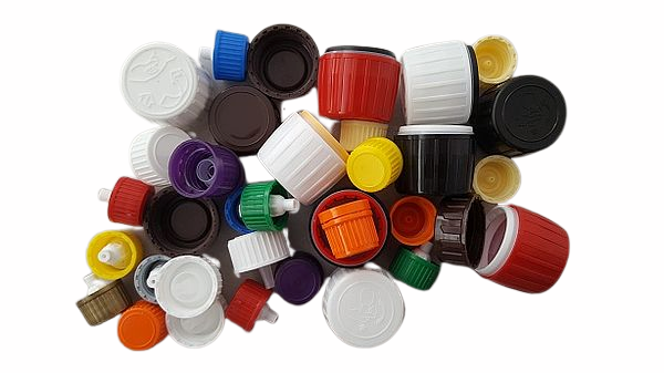 Screw caps of different colors in a heap