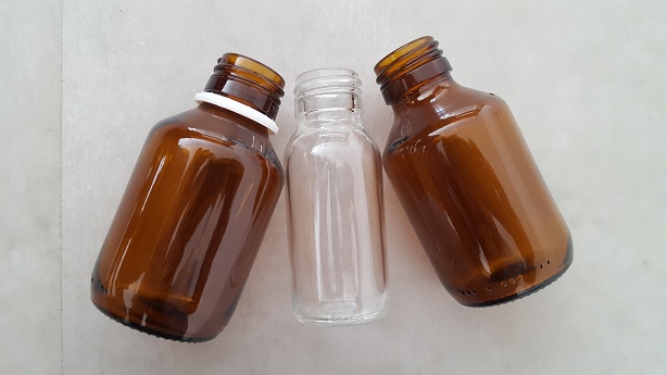 3 bottles side by side clear and brown from SGD
